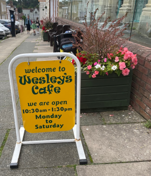 Wesleys outside sign